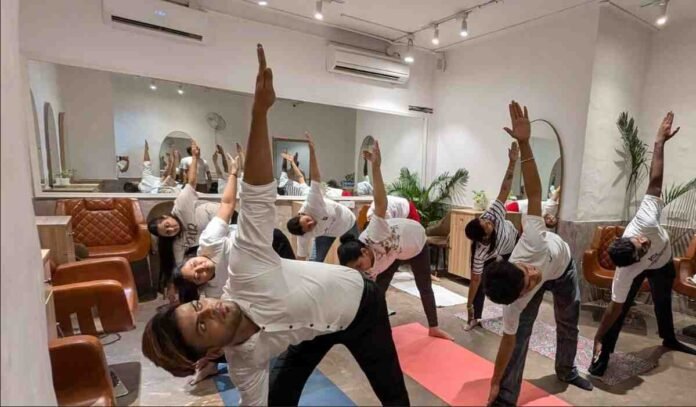 FHRAI, Harit Yoga, Ministry of Ayush, Yoga Session, Wellness Event, Environmental Consciousness, Sustainable Living, Blossom Kochhar College of Creative Arts & Design ,BKCCAD, New Delhi Event, Holistic Health, Sapling Distribution, International Day of Yoga, IDY, Shri Narendra Modi Prime Minister, Dr. Blossom Kochhar, Samantha Kochhar, Payal Swami FHRAI, Hospitality Sector Wellness, Yoga for Environment, India Wellness Initiatives, Greater Kailash Event,